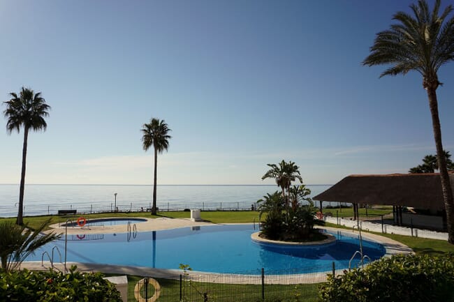BEACHSIDE 2 BEDROOMS APARTMENT WITH BEAUTIFUL VIEWS OF THE COMMUNAL GARDEN, POOL AND THE SEA